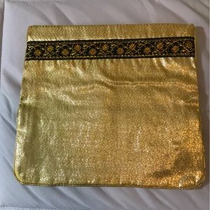 Vintage gold lame hosiery bag.